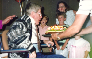 Grandpappy at his 75th birthday party. See Jag Boy, his mouth open in amazement - so many candles. Beside his is Wonder Boy in front of Momma. Ah, the world was so much kinder then....